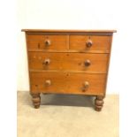 A Small Victorian pine chest of drawers with two short over two long drawers. (a.f damages to