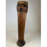 A tall African tubular tribal drum. H:112cm