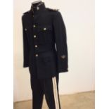 A Royal Army Service Corps dress uniform labelled Austin Reed dated 1957 also with a cap