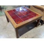 A Danish mid century teak and tiled square coffee table with danish and makers stamp. With sixteen