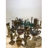 A quantity of copper, pewter, brass and other metal items including a wall sconce, candlesticks,
