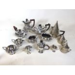 4 sets of silver plate tea and coffee sets, including one by Maple and Co, London, and another by