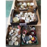 Four boxes of mixed ceramics and glass including commemorative mugs and others