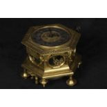 A rare and early 18th century, quarter repeating German gilt table clock engraved M Rieppolt in