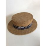 A Straw Boater by Fredk. Gorringe Ltd. Inscription inside Elizabeth - with fondest and most