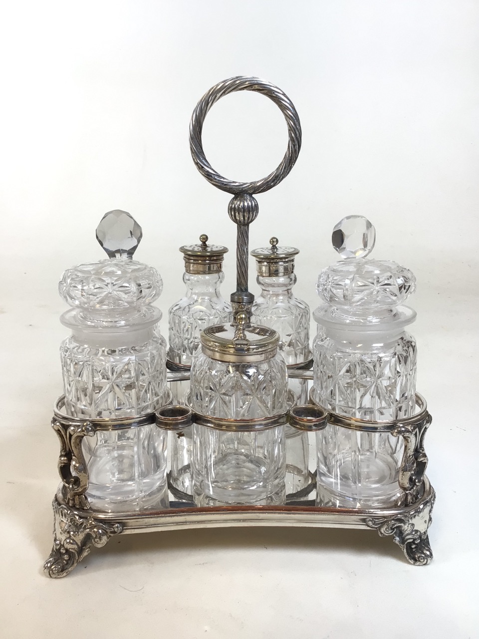 Two silver plate and cut glass cruet sets. A 7 and 4 piece condiment caddy respectively. Good - Bild 2 aus 15