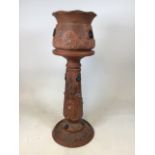 Large terracotta Bretby jardiniere and stand. AF, some losses. Planter 30cm diameter. W:38cm x D: