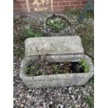 A pair of reconstituted stone garden troughs. W:70cm x D:28cm x H:25cm