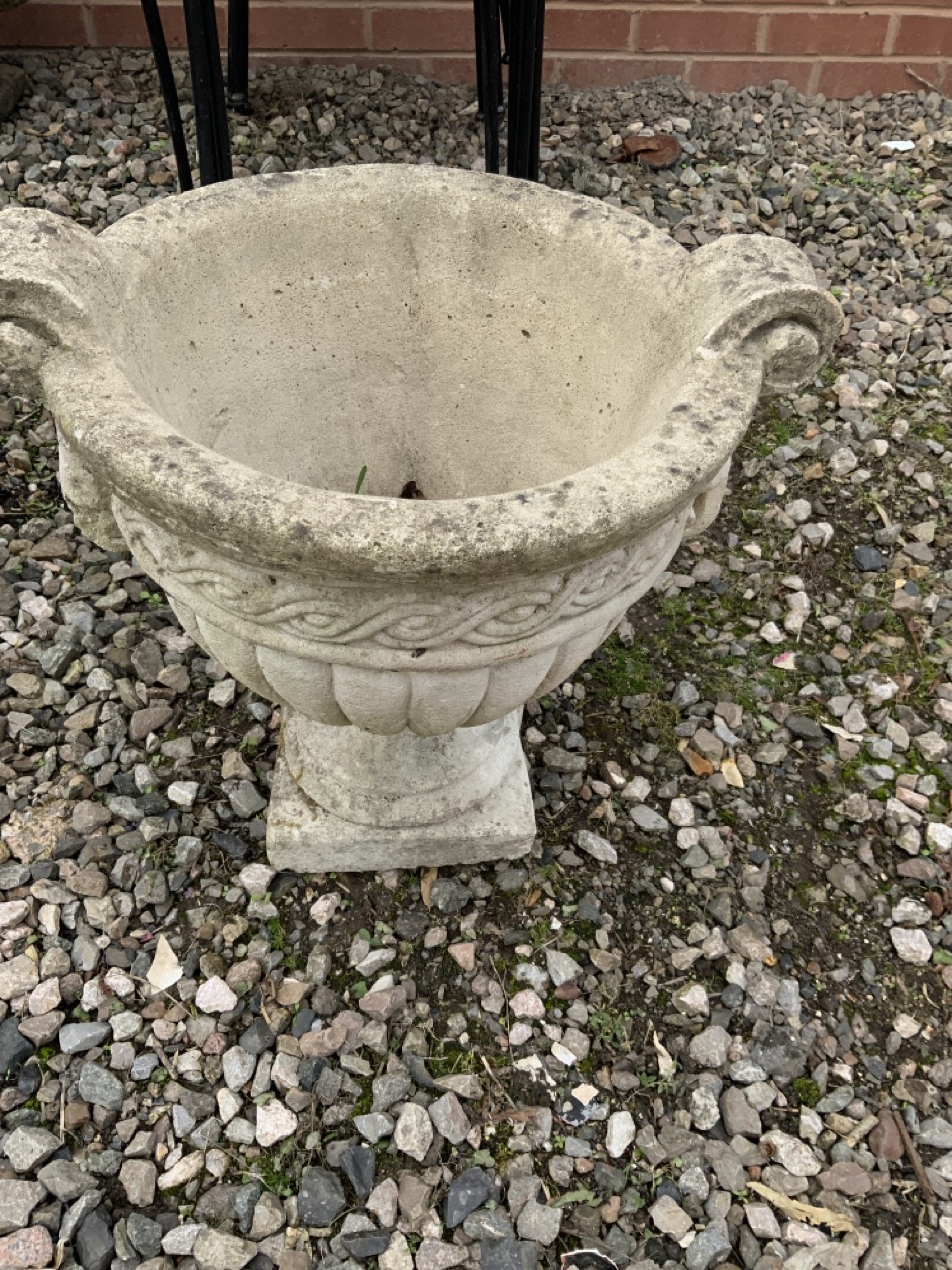 A reconstituted stone planter.