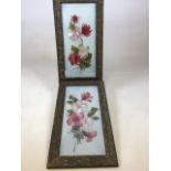 A pair of glass painted panels of flowers in floral decorated gilt frames W:32cm x H:56cm