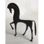 A bronze style sculpture of a horse with engraved symbols on body W:17cm x H:21cm