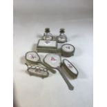 A vintage Regent dressing table set including hand mirror, brushes, candle sticks, trinket boxes and