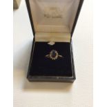 14ct gold sapphire ring with white stones. Total weight approx 2gm. Size O. Marked 585