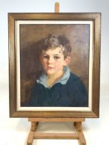 A mid 20th century portrait of a you boy. On canvas in gilt frame with fabric mount. W:38cm x H: