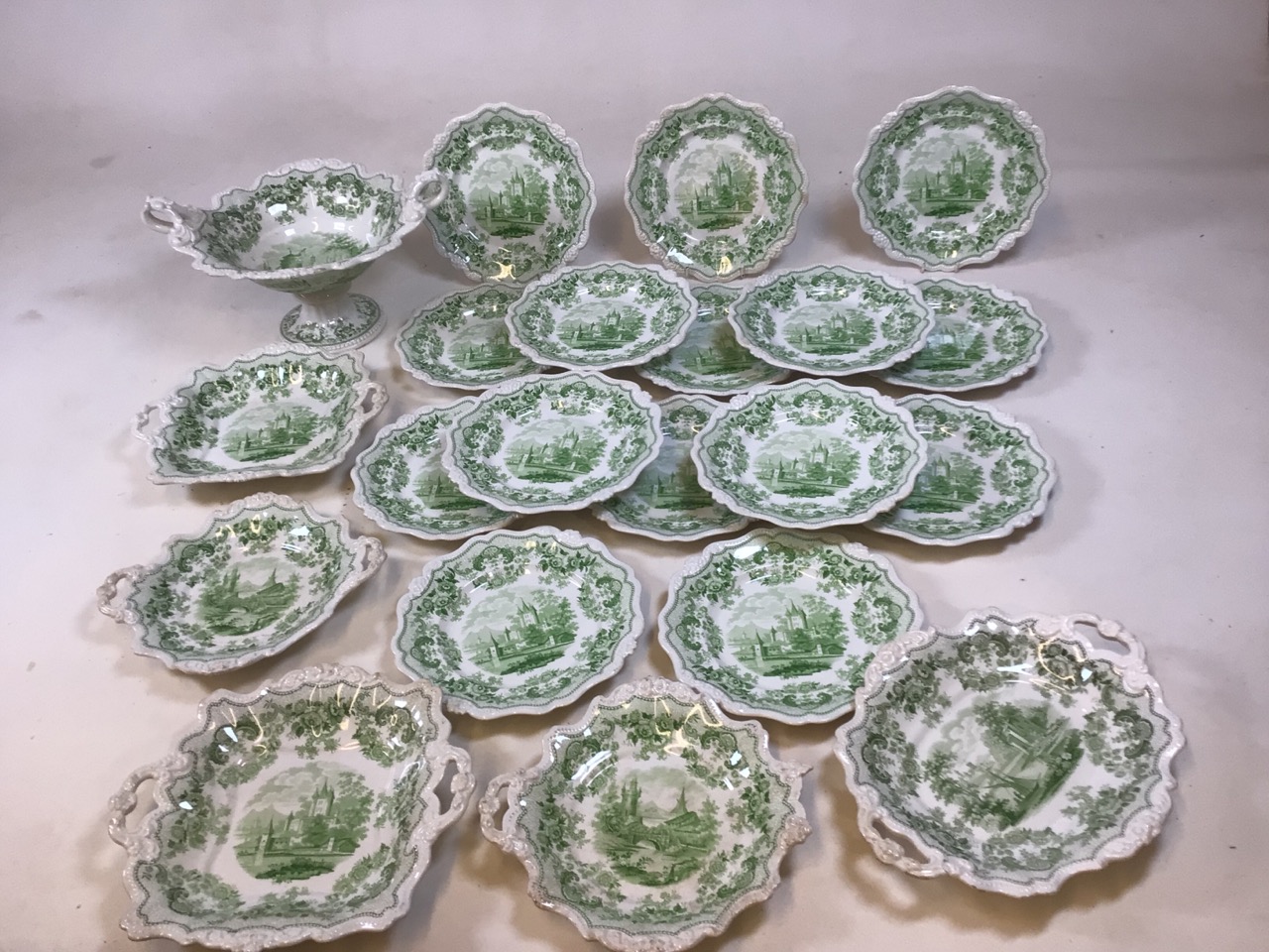 Pomerania green and white china by John Ridgway circa 1835. Comprising 15 plates 23cm, 5 assorted