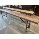A pair of pine benches with metal folding legs and support stretcher. Each bench with breather