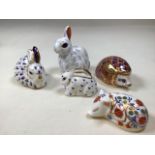 A collection of Royal Crown Derby paperweights with gold stoppers including two rabbits, a hare, a