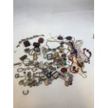 A quantity of costume jewellery including paste buckles, hair clips, brooches and other items