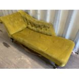 A Victorian button back and sided chaise lounge. W:65cm x D:190cm x H:70cm.