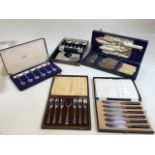Boxed vintage silver plated cutlery sets including an Exquisite silver jubilee commemorative set,