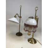 Two brass table lamps - one with beaded glass shade and one other glass shade. Height of tallest