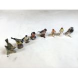 8 ceramic bird figures, from Royal Worcester, Goebel of West Germany and Beswick. Bullfinch, Great