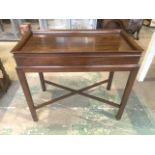 A Chinese style mahogany side table with X stretchers to base W:84cm x D:46cm x H:74cm