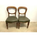 Five of oak leather seated balloon back dining chairs on fluted legs.. Seat height H:46cm