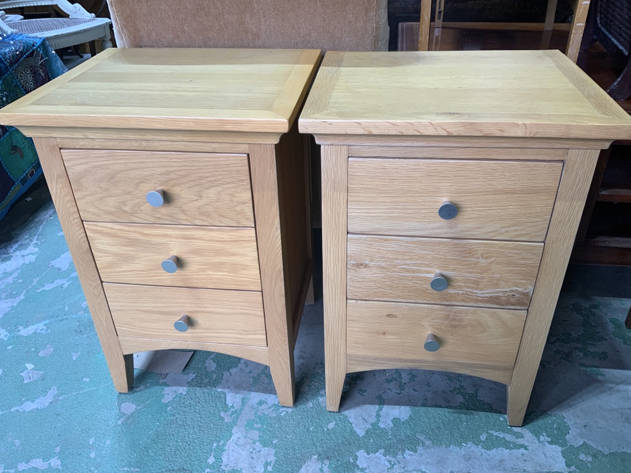 A pair of modern good quality bed side chests, three solid drawers with metal handles. W:42cm x D: