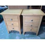 A pair of modern good quality bed side chests, three solid drawers with metal handles. W:42cm x D: