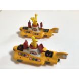 Two unboxed Corgi Toys -The Beatles Yellow Submarine. One with figures of John, Paul, George and