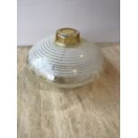 A glass mid century ceiling light with others