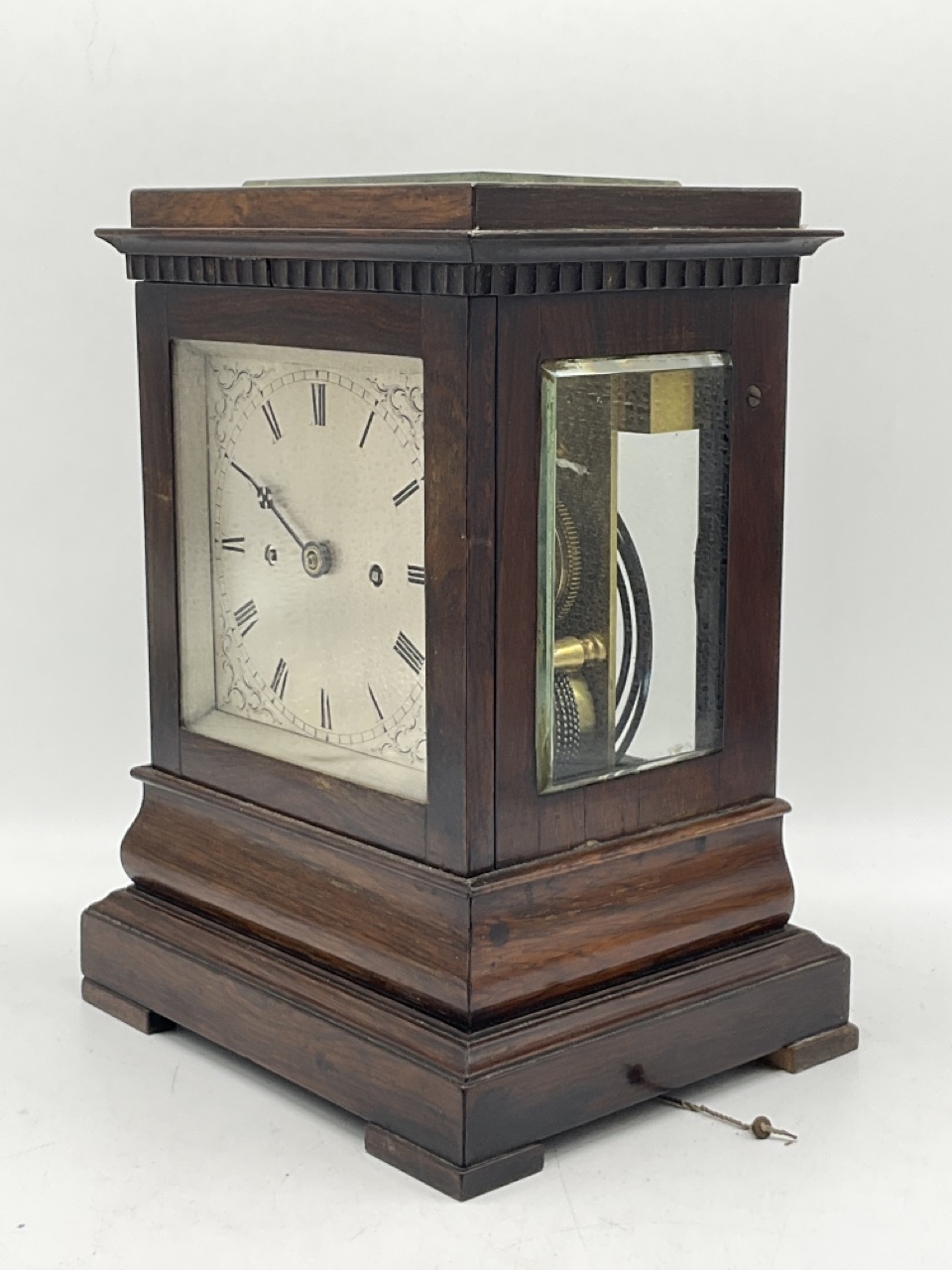 A good four glass fusee mantel clock in rosewood case. Bevelled glass to 3 sides and the top of