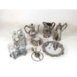 Quantity of silver plate items to include pouring jugs, coffee pots, spirit decanters and a brandy