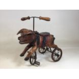 A vintage style toy pig tricycle. One stirrup missing H:50cm