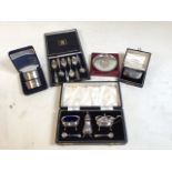 Hallmarked silver sets, 5 total including napkin rings, decorative spoons and a set of shakers. Good