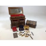 Two wooden jewellery chests with a quantity of vintage cuff links and other items