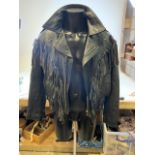 A vintage fringed leather jacket with studs to reverse branded Skin. Biker-rocker jacket. Size XL