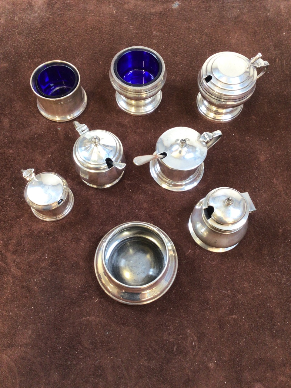 Hallmarked silver condiment pots, some with glass inserts, two with spoon. Total weight including