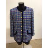 A Givenchy en Plus Tweed jacket with gilt buttons trimmed with navy velvet. Continental size 48.