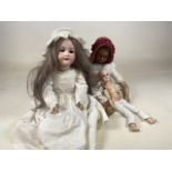 Three antique dolls. One large Armand Marseille Armand 246/1, brown eyes and open mouth with