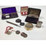 A vintage leather bound sewing case also with cufflinks, a quartz travel clock and other items