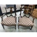 A pair of inlaid Edwardian open arm bedroom chairs. Seat height H:34cm