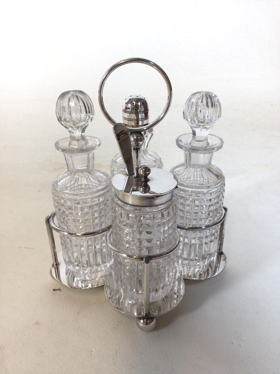 Two silver plate and cut glass cruet sets. A 7 and 4 piece condiment caddy respectively. Good - Bild 10 aus 15