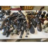 A very large collection of African treen and stone ware items.