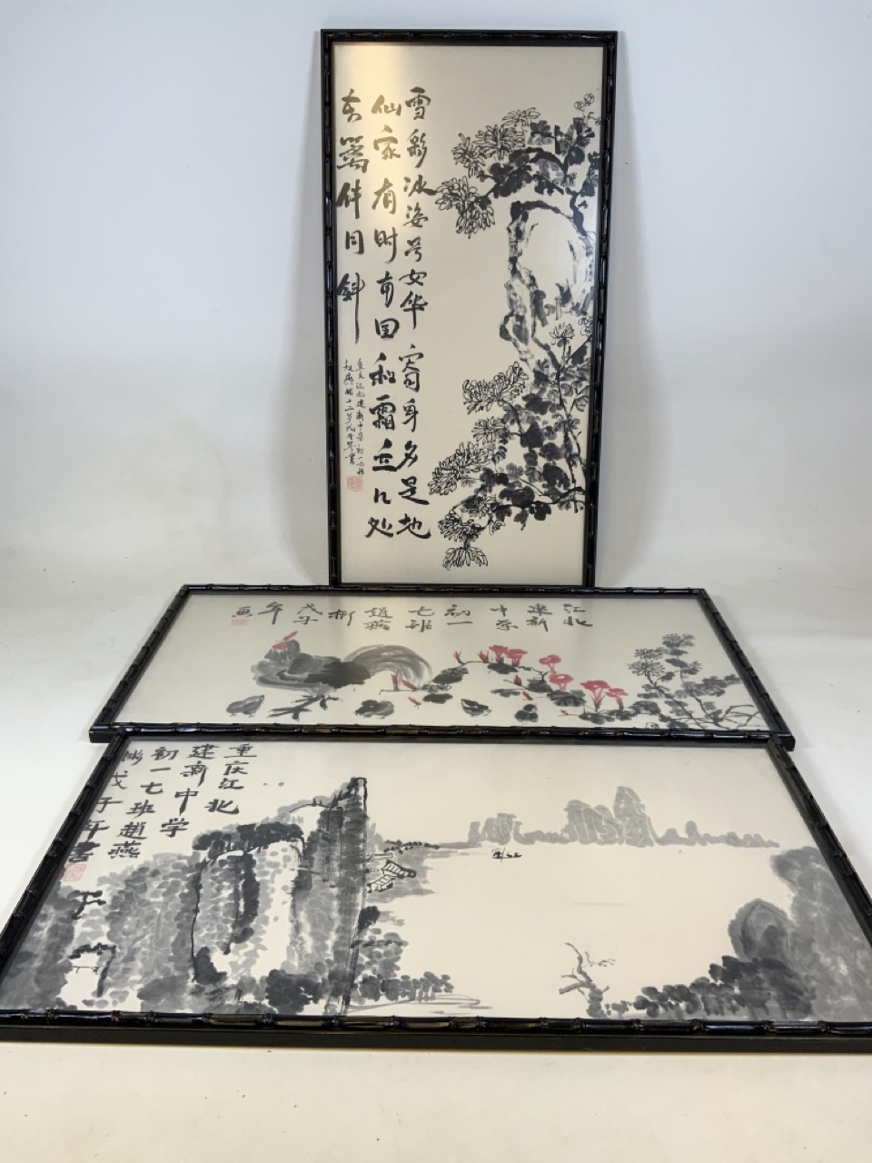 Three Chinese watercolours in ebonised bamboo style frames under non reflective glass. Approx W: