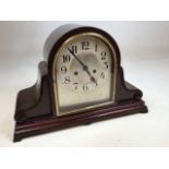 A vintage wooden Mantel clock - no makers mark W:45cm x H:29cm