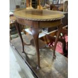 An early 20th century oval occasional table with under shelf. W:61cm x D:45cm x H:59cm