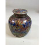 A Chinese polychrome lidded jar decorated with design of dragon and a mountain scene. Character mark