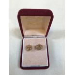 A pair of 9ct gold knot earrings. Width of knot 1.1cm